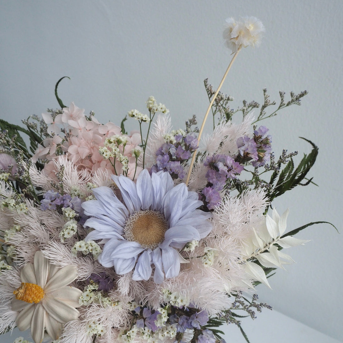 Dyed Sunflower Preserved flower arrangement by The Bloom Box
