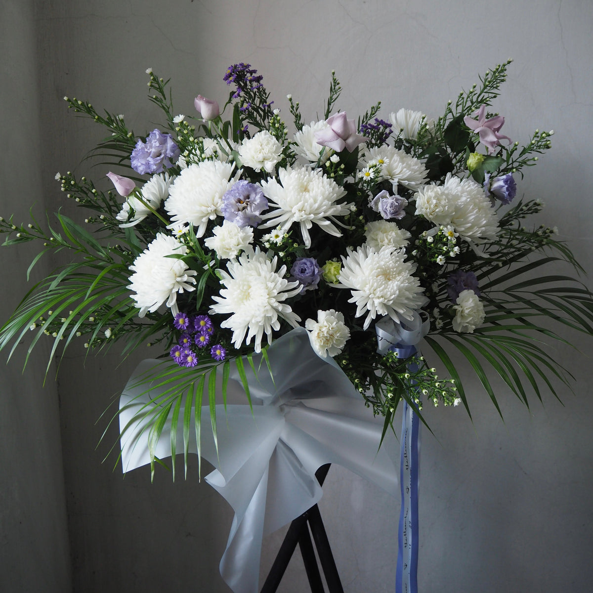 Condolence Flower Stands vs. Wreaths: What Is the Difference and Which Should You Send?