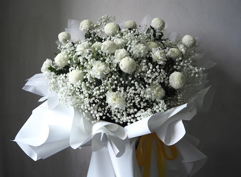 Condolence Flower Stands vs. Wreaths: What Is the Difference and Which Should You Send?