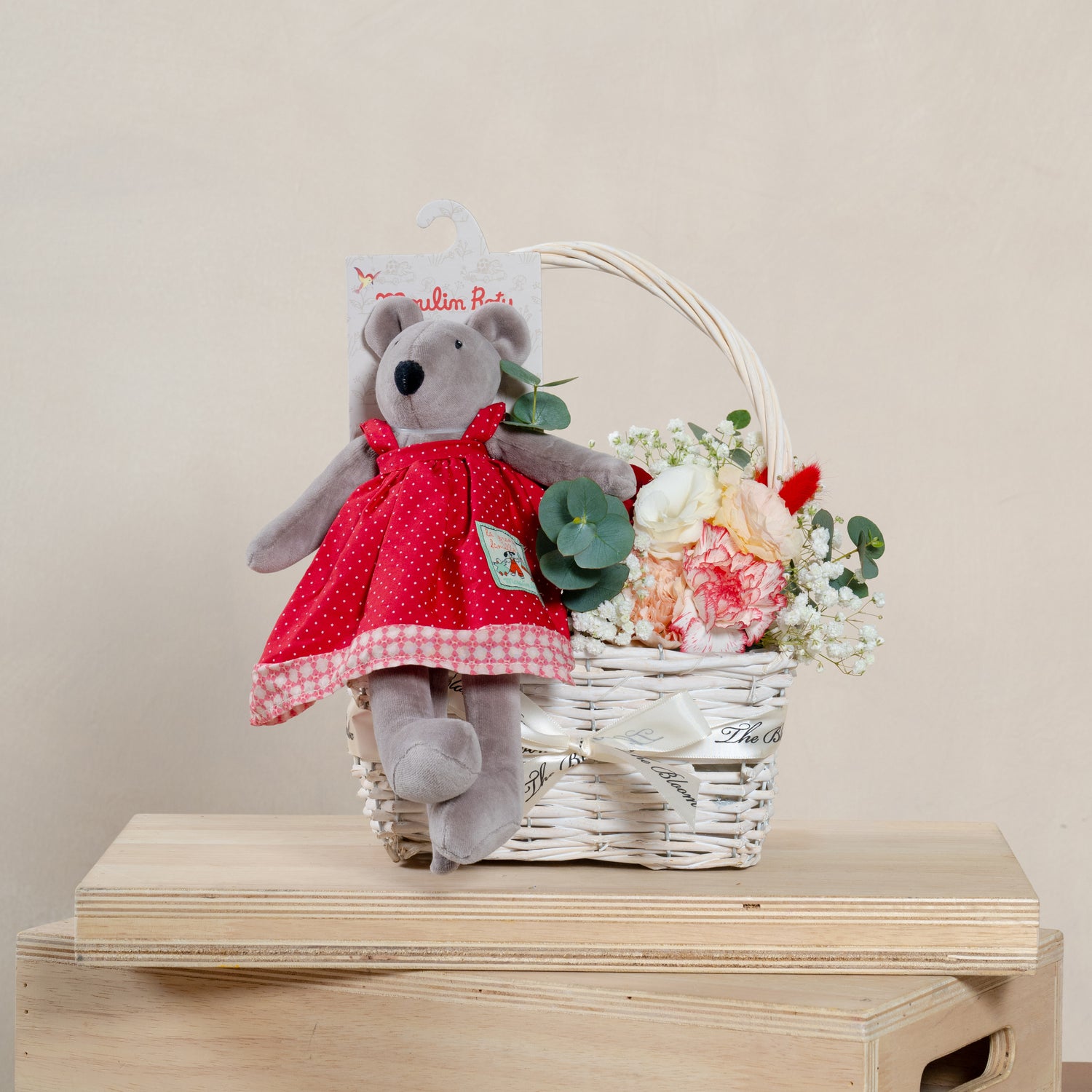 flower arrangement in basket with moulin roty&