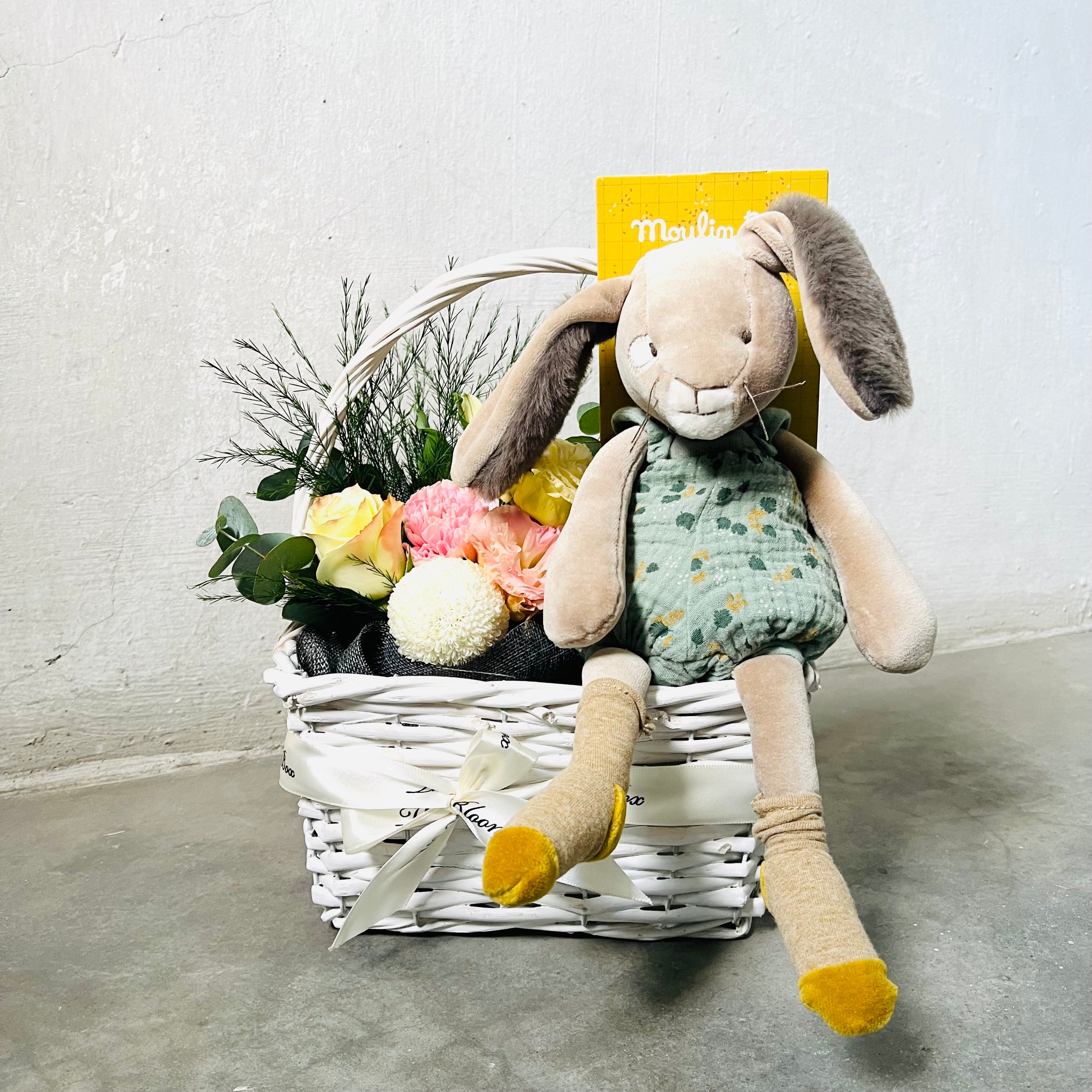 flower arrangement in basket with moulin roty&