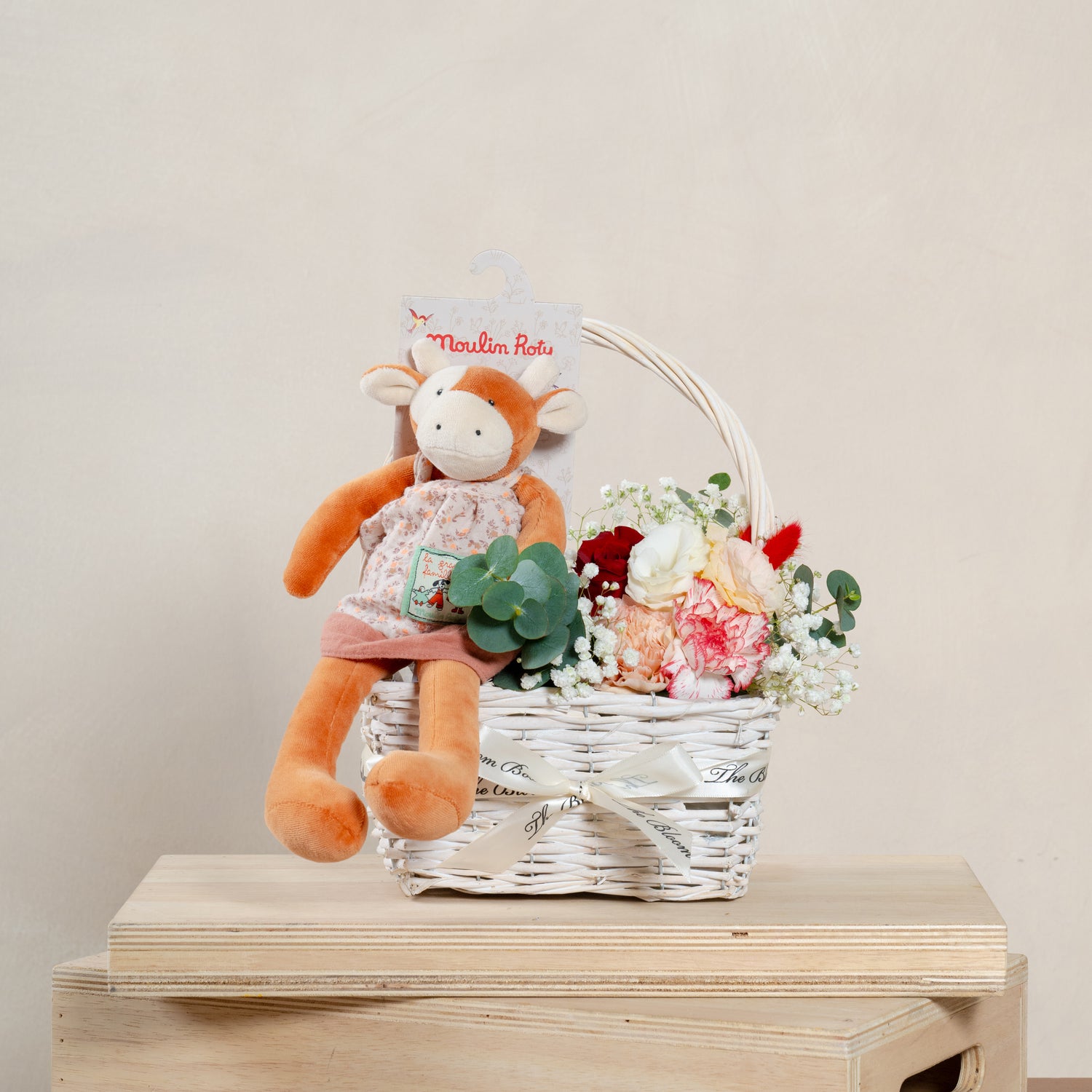 flower arrangement in basket with moulin roty&