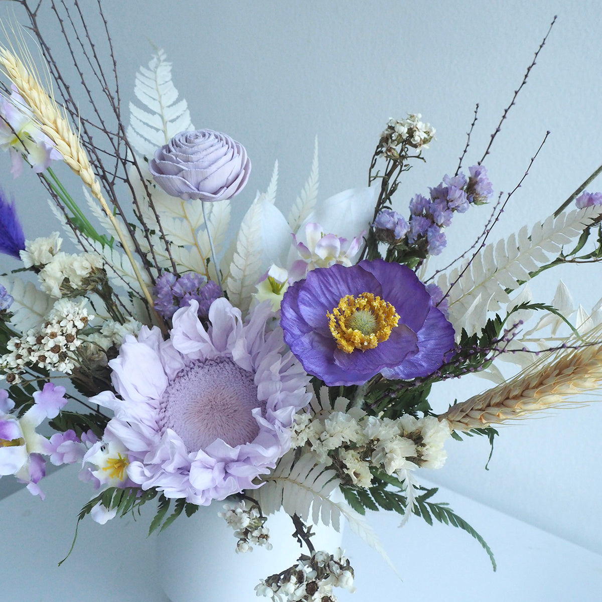 Preserved flowers in purple for anniversary or birthday celebrations. 