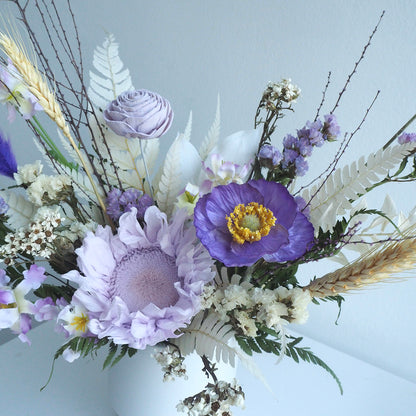 Preserved flowers in purple for anniversary or birthday celebrations. 