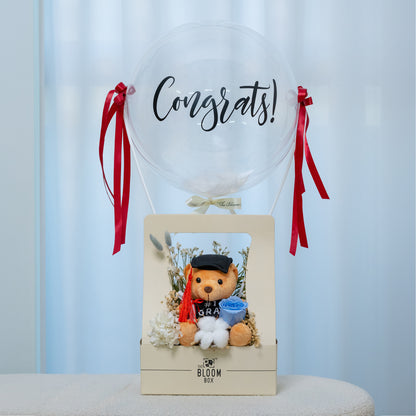 the bloom box with grad bear in blue preserved rose