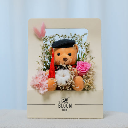 graduation bear with ink preserved rose arrangement