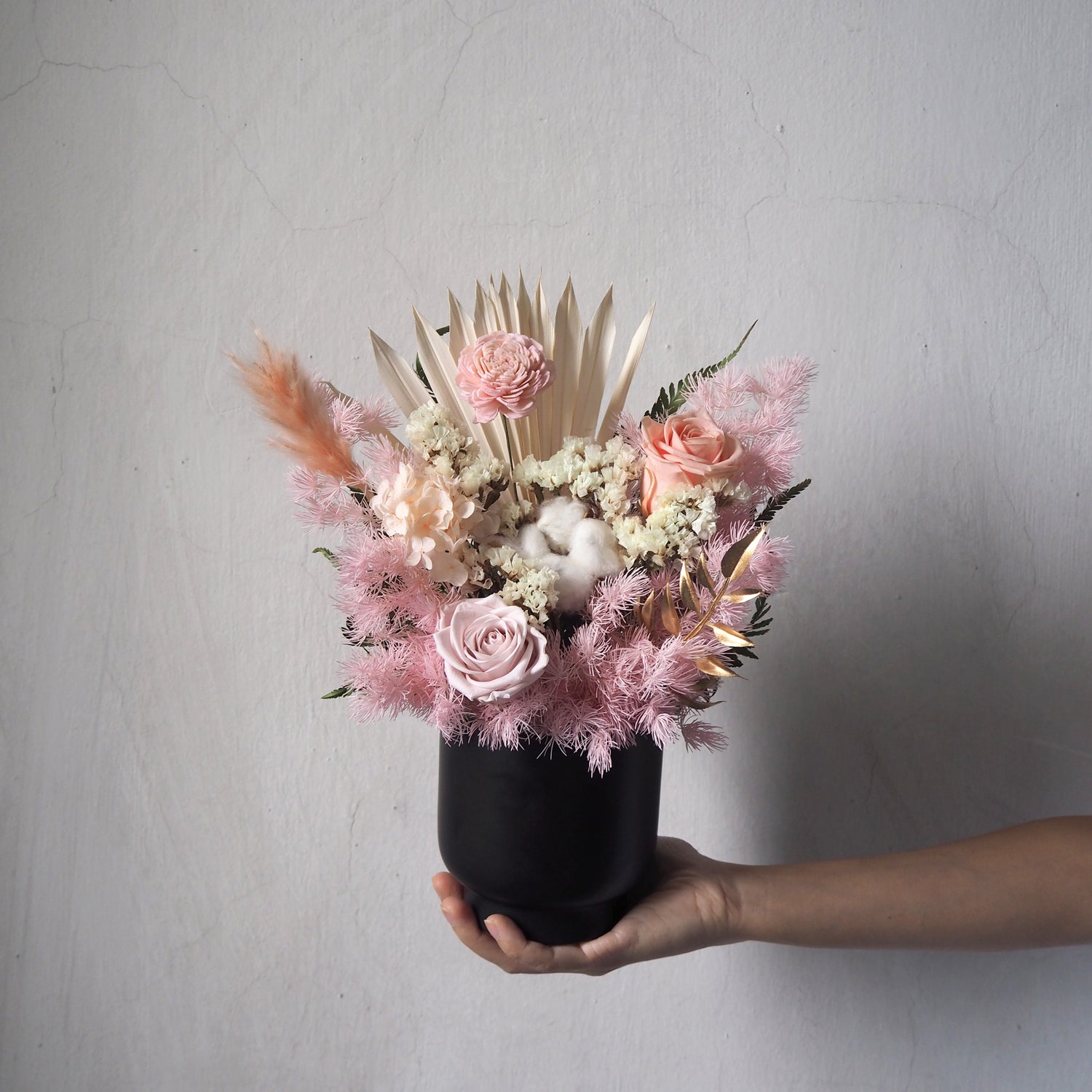 pink preserved roses flower arrangement