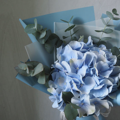 close up of blue hydrangea bouquet